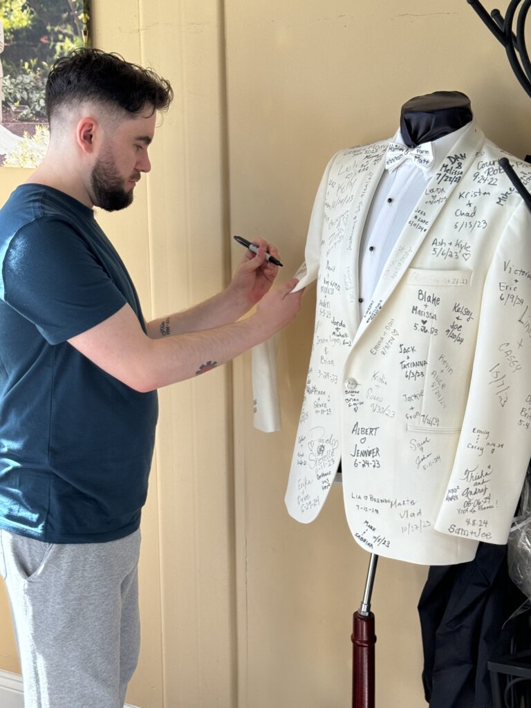 Renting a tuxedo or suit ar Darianna Bridal & Tuxedo means you get to sign the jacket!  