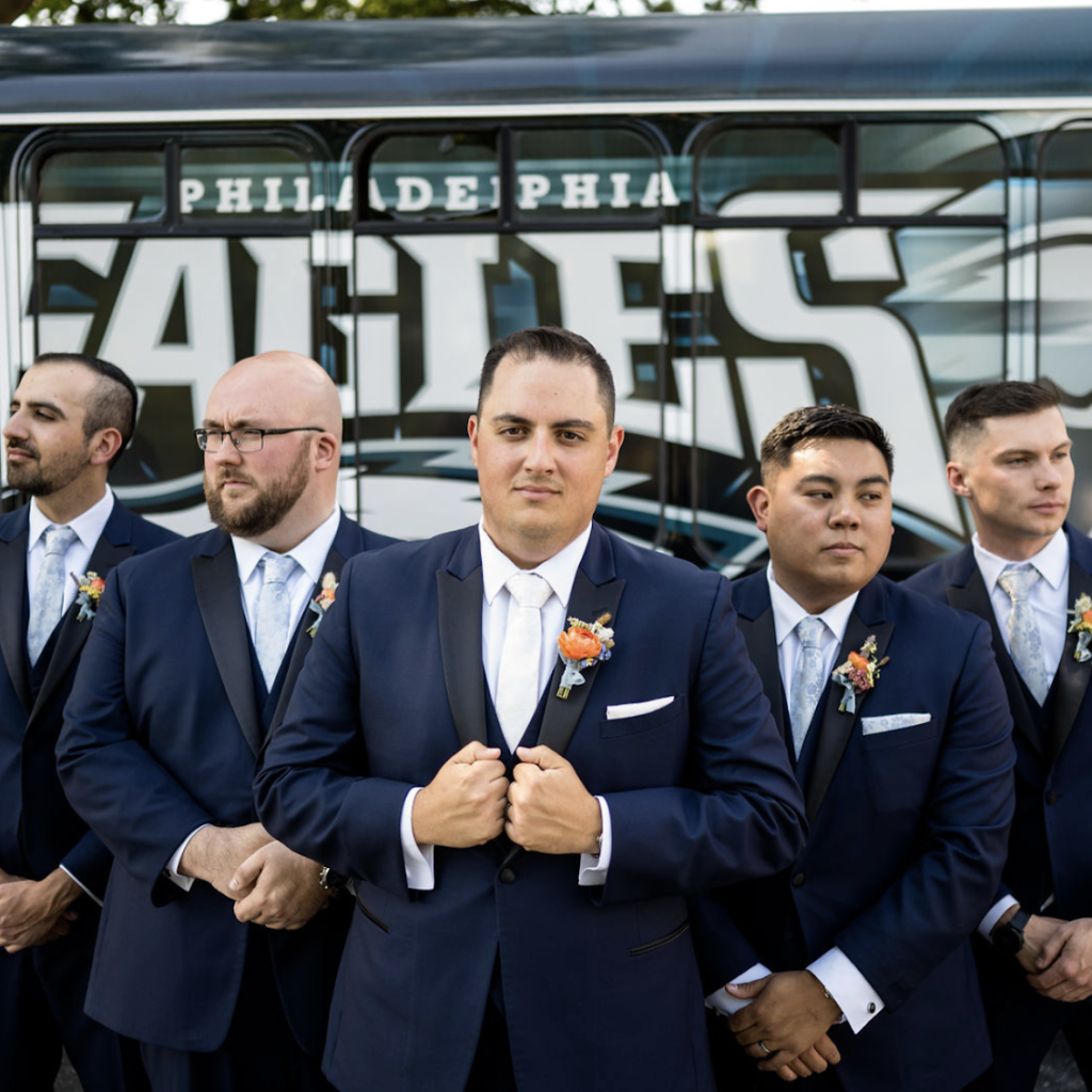 Renting a tuxedo or suit in the Philadelphia region at Darianna Bridal & Tuxedo, groom transported his groomsmen in an Eagles bus
