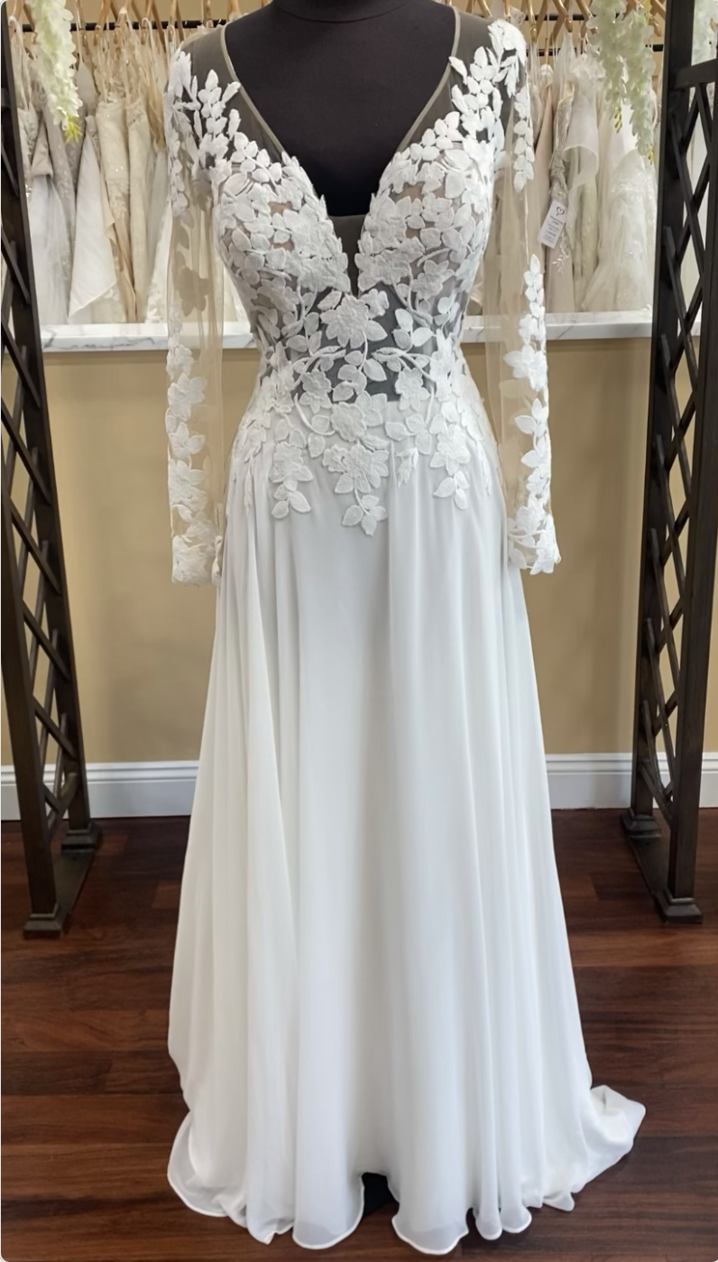 Lace and chiffon wedding dress with mesh top, floral, lace, and vine pattern, extending down to a dropped waist, silhouette and plain chiffon skirt