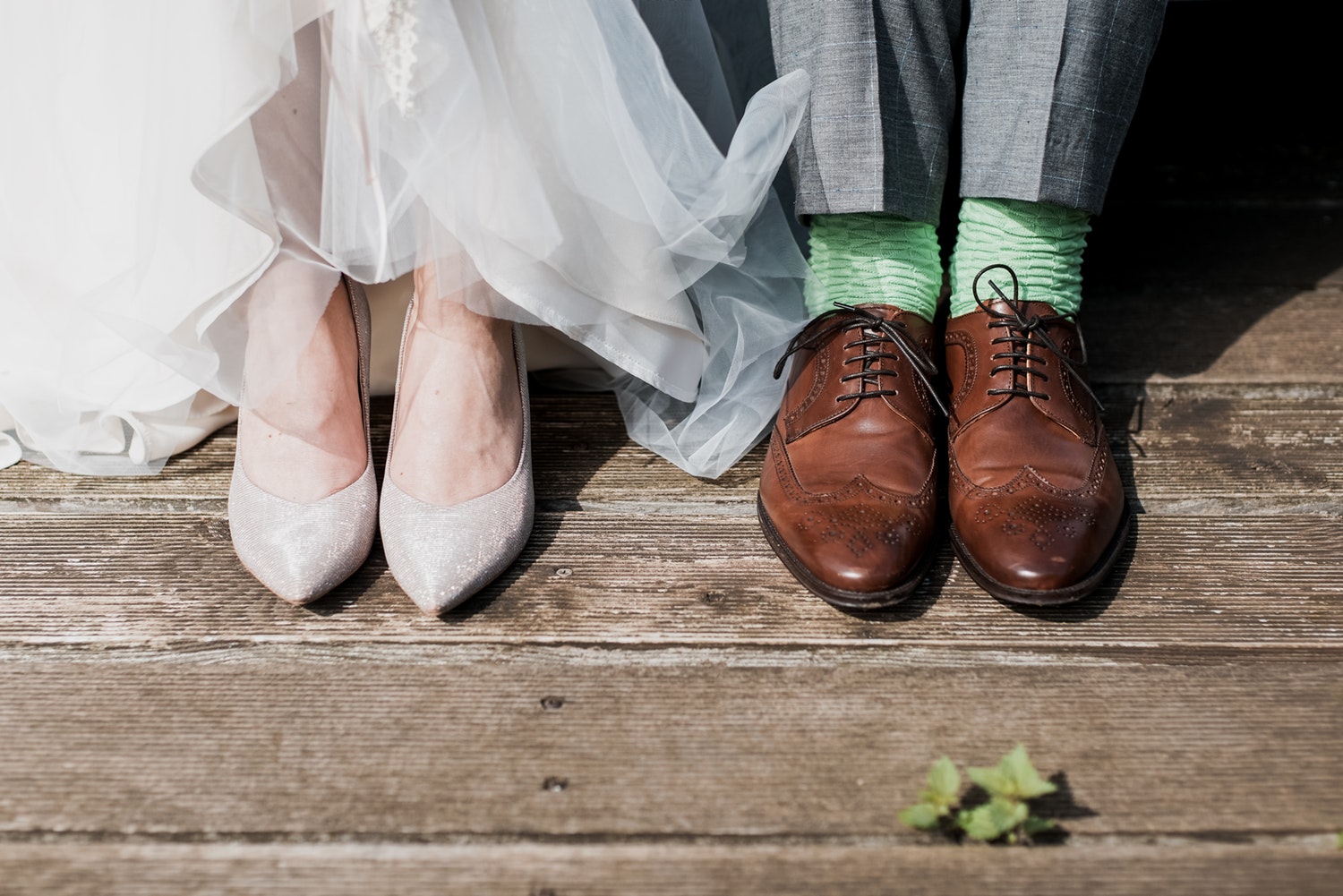 Pairs of men's and women's wedding shoes