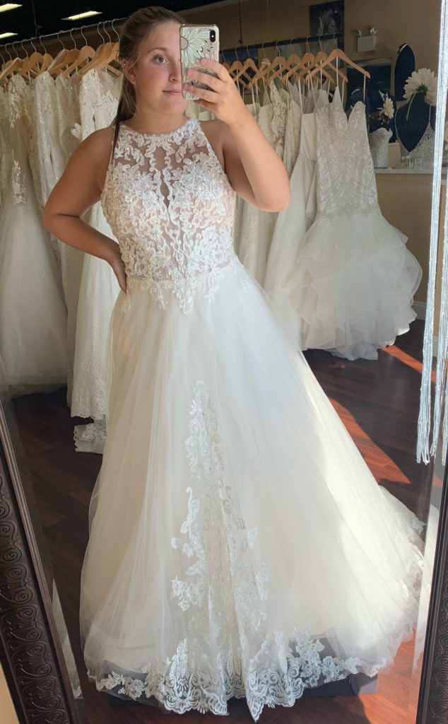 Lace bridal dress with a halter neck line, sparkles, a line, tulle skirt