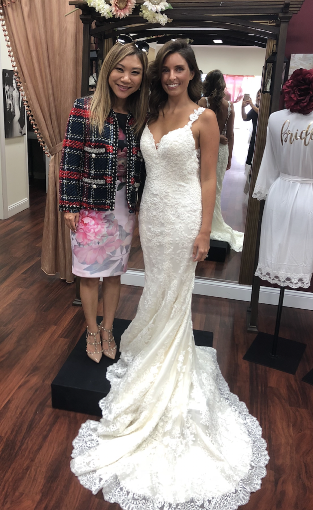 Wedding dress designer Kitty Chen at Darianna Bridal & Tuxedo with a real bride. Bride said yes to a dress named "Daria" and was thrilled to meet the designer in person!