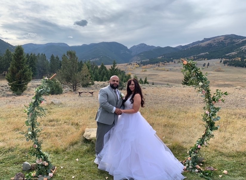 Bride and groom in spectacular Montana with a heart cloud clearly overhead
