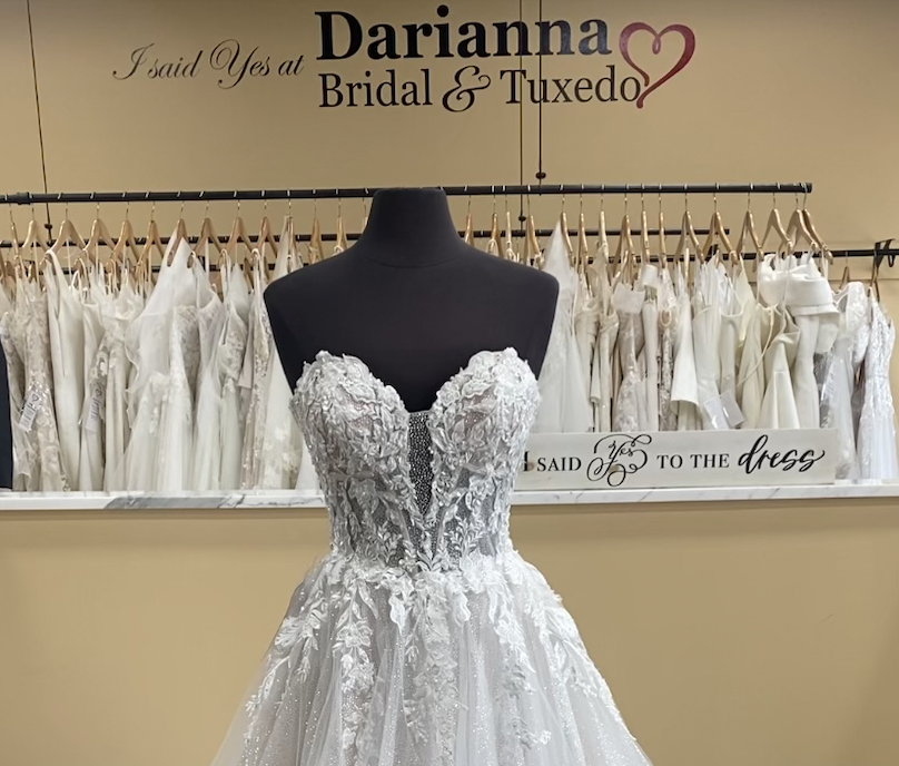 Dominique wedding dress features a sparkle tulle plunge sweetheart neckline