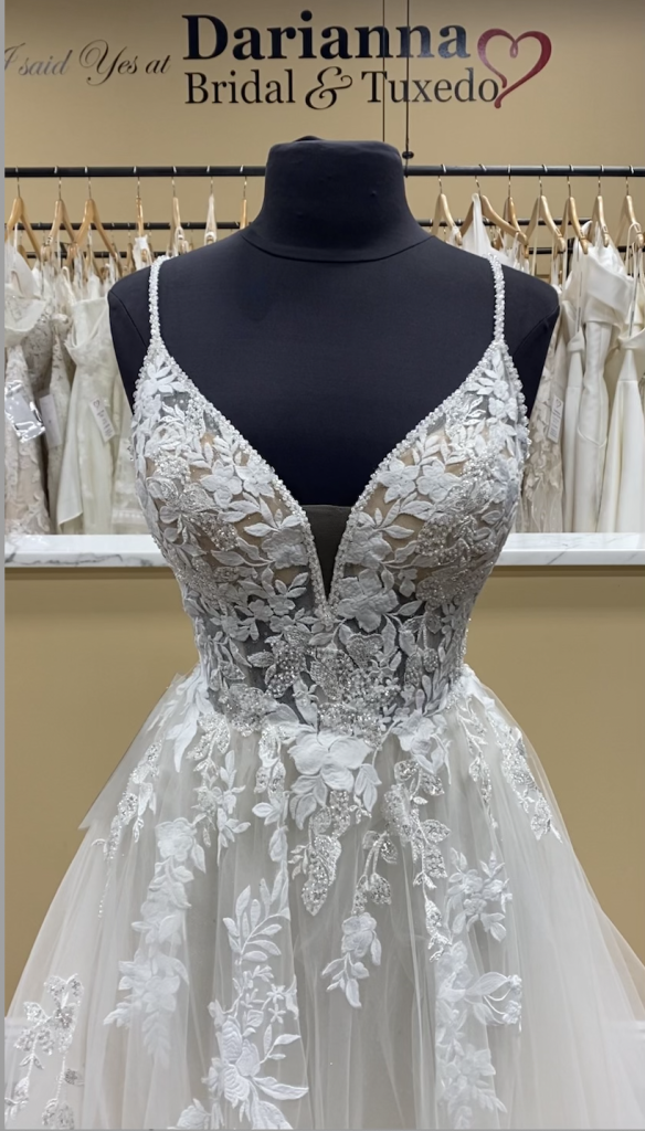 Omarra's Beaded lace and sparkle bodice has a tightly cinched waist for a super flattering shape