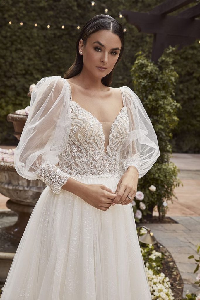 Carrie by Casablanca has layers of tulle with seed pearls