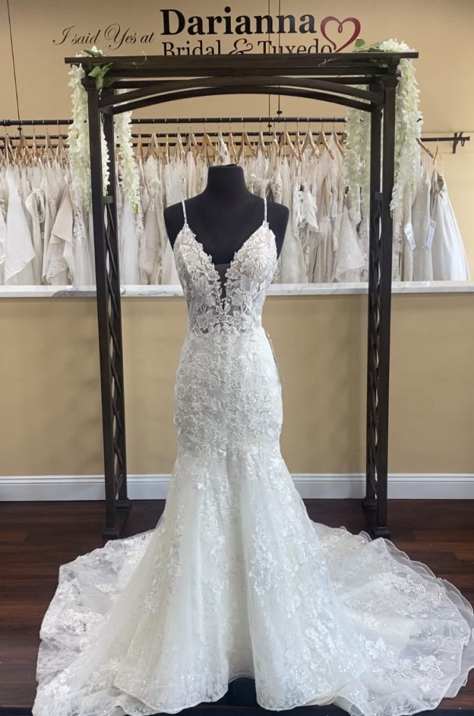 Mia Solano's Vera wedding dress, a sparkling fit and flare with a gorgeous lace train