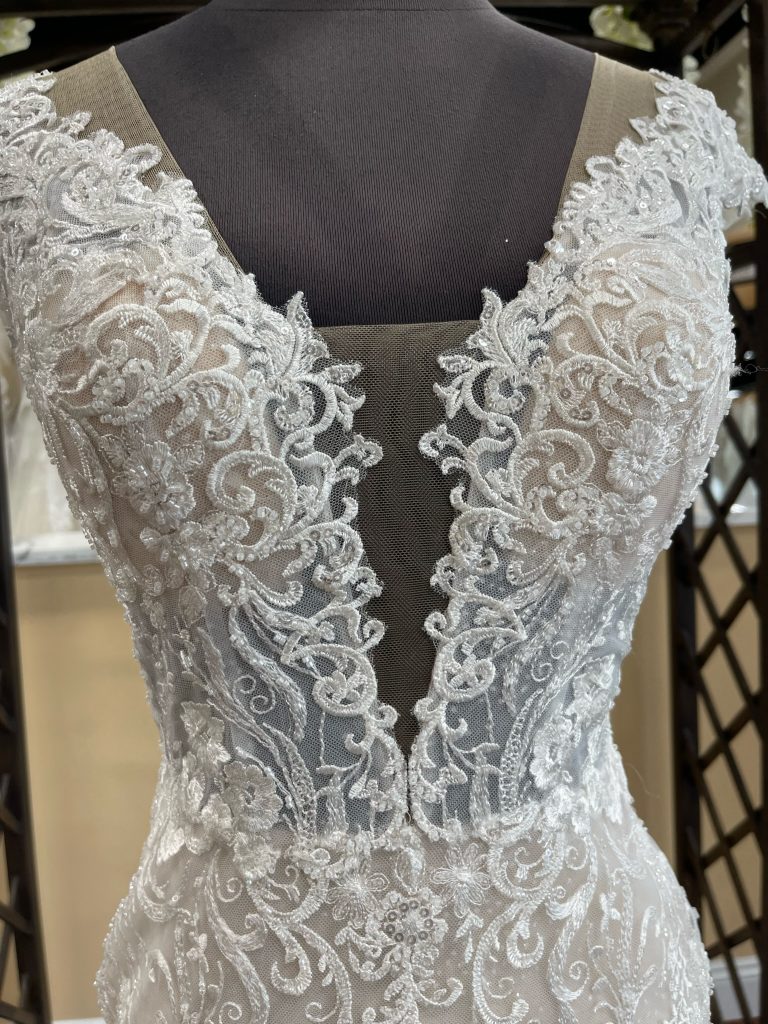 Franca has a lovely plunge neckline with mesh and lace 