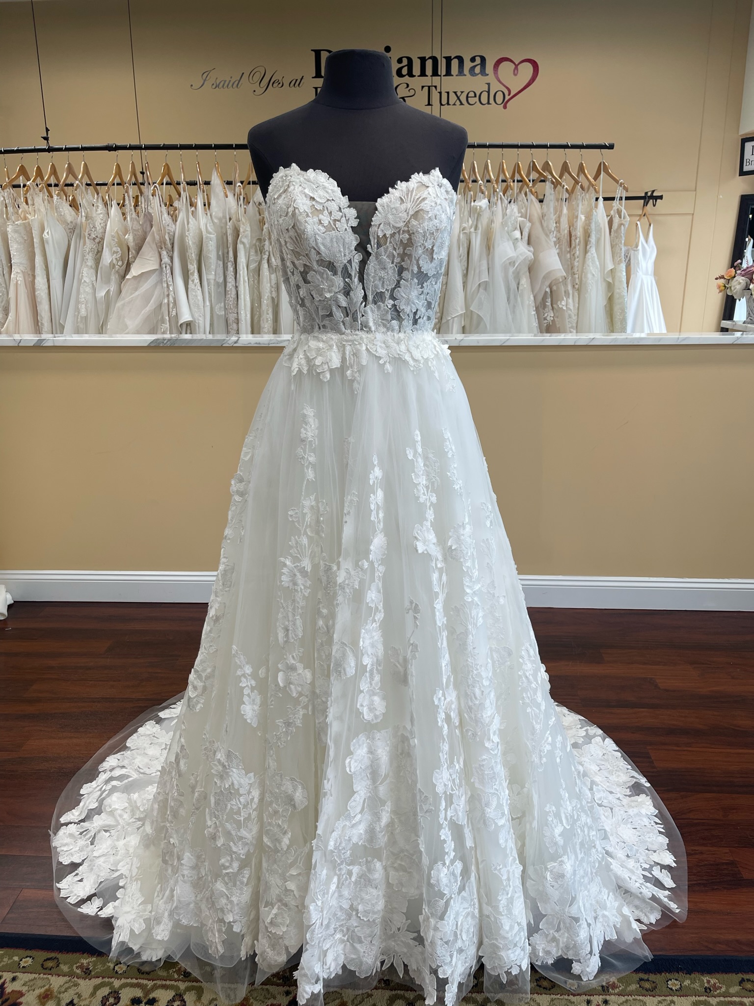 Casablanca bridal Jolie wedding dress is a fit and flare that turns into a ball gown with an over skirt