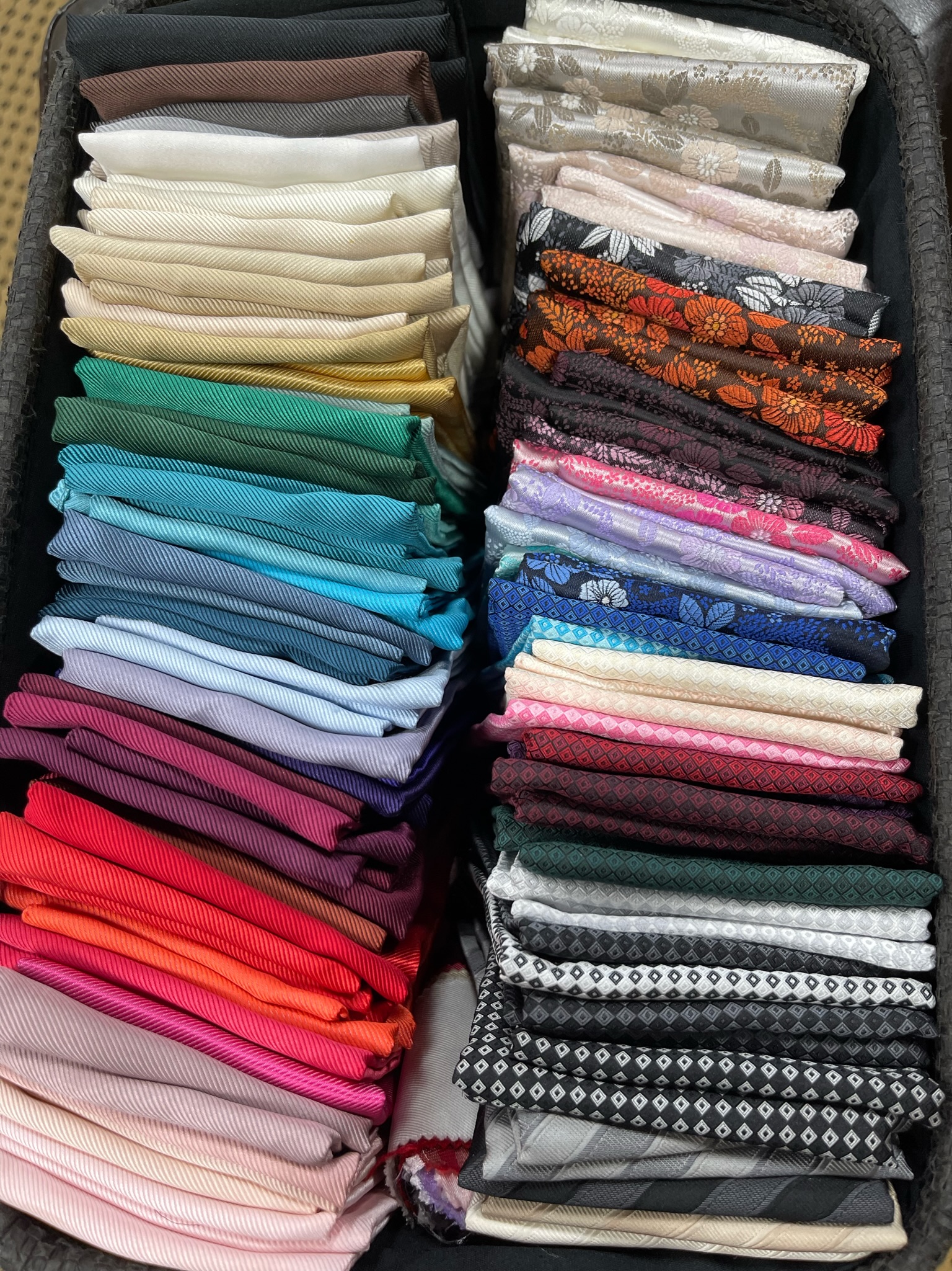 Colorful box of pocket squares 