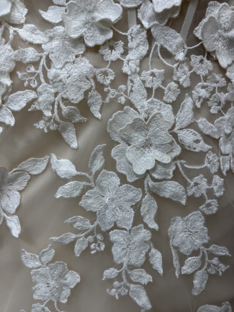 Picture of 3-D floral lace with petals elevated in layers