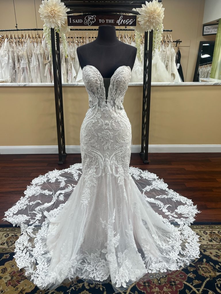 Kitty Chen Aviana lace wedding dress has a fit and flare shape, sweetheart neckline with plunge, and side cutout