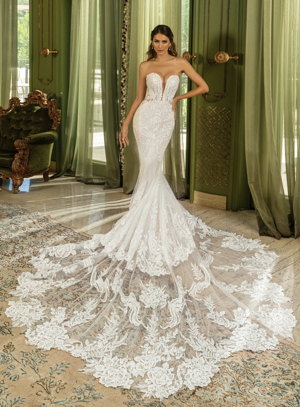 Kitty Chen Aviana lace wedding dress has a fit and flare shape, sweetheart neckline with plunge, and side cutout