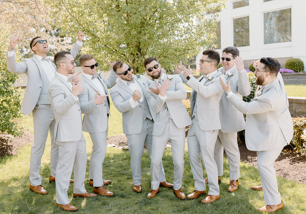 Groom and his men posing in the Ike Behar light gray Griffin suit