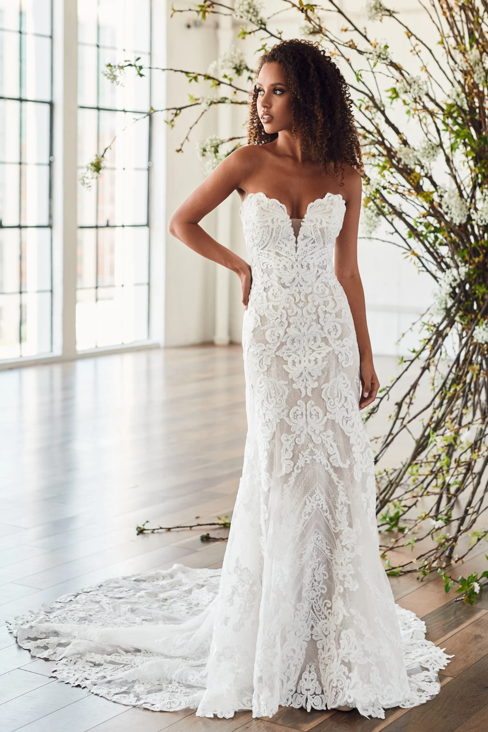 Gemma from Serene Bridal is a boho lace strapless fit and flare 