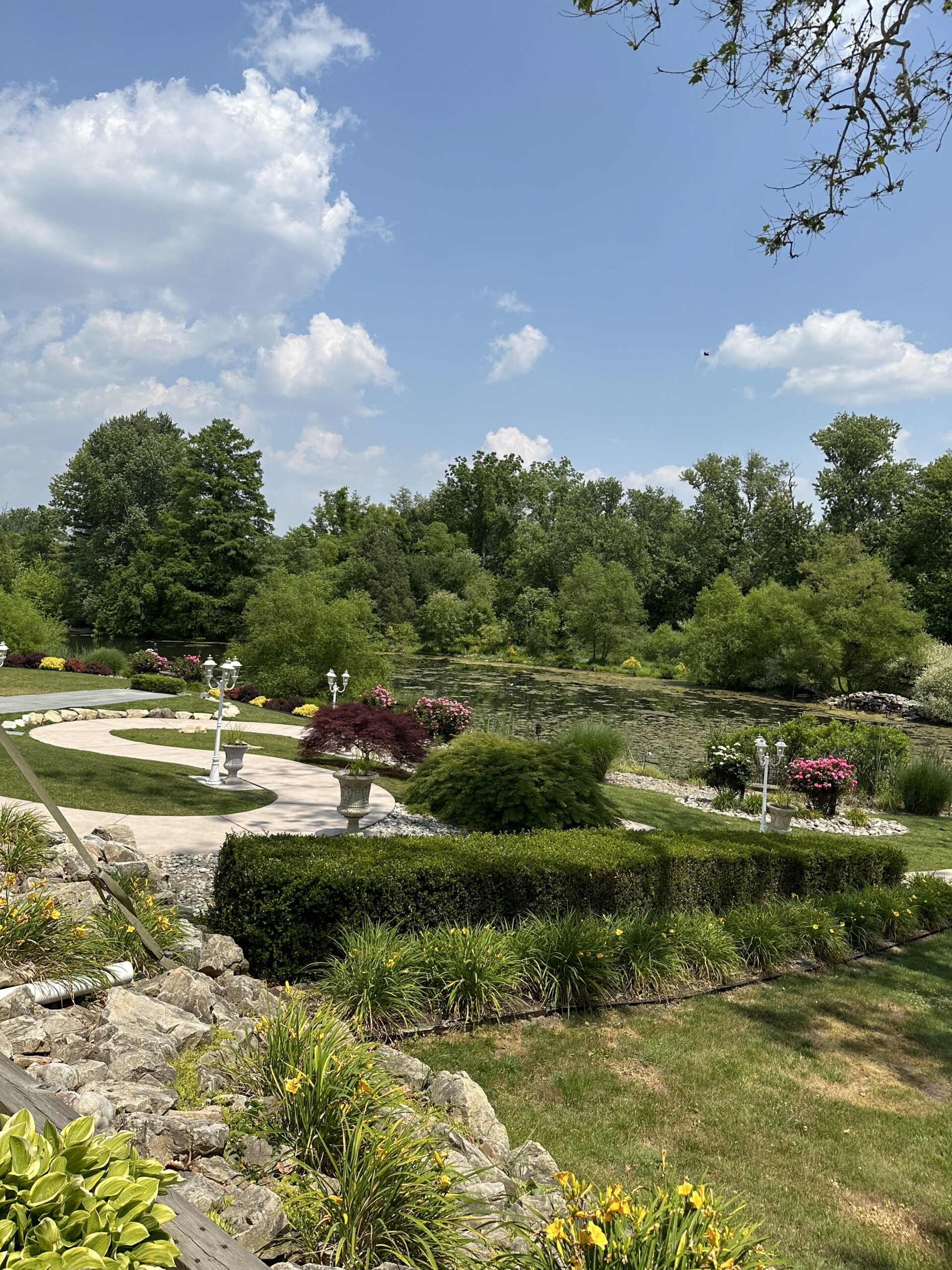 The manor house at prophecy creek in Ambler Montgomery County Pennsylvania offers, winding pathways and ponds, manicured and mature, landscaping perfect for photos