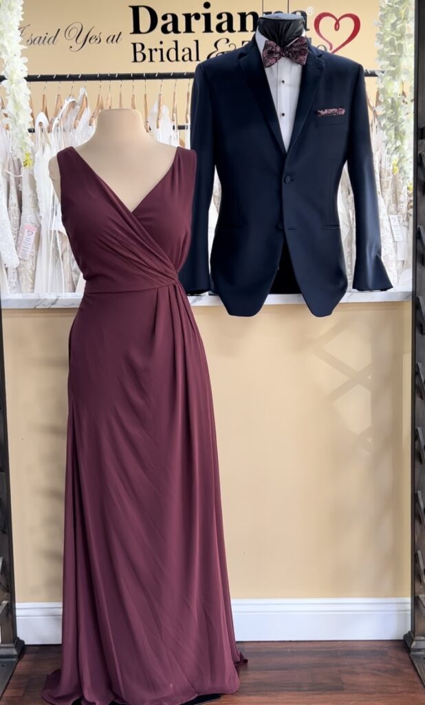 Bridesmaid wine color dress and tuxedo with matching bow tie, and pocket square
