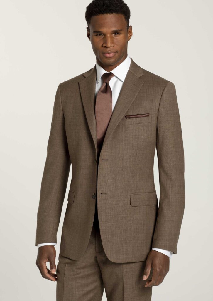 Three piece brown suit, two button jacket, cognac color satin tie, and pocket square, white shirt