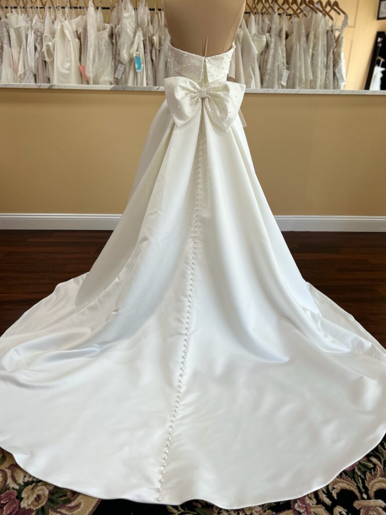 stella york wedding dress train with pearls and buttons