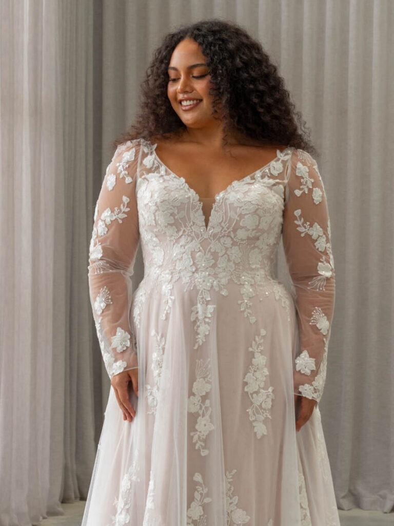 Long sleeve layered lace is a good winter wedding dress in plus size