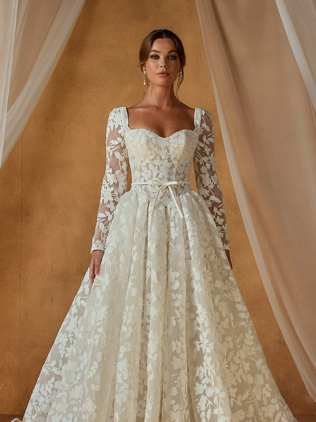 Long sleeve layered lace is a good winter wedding dress