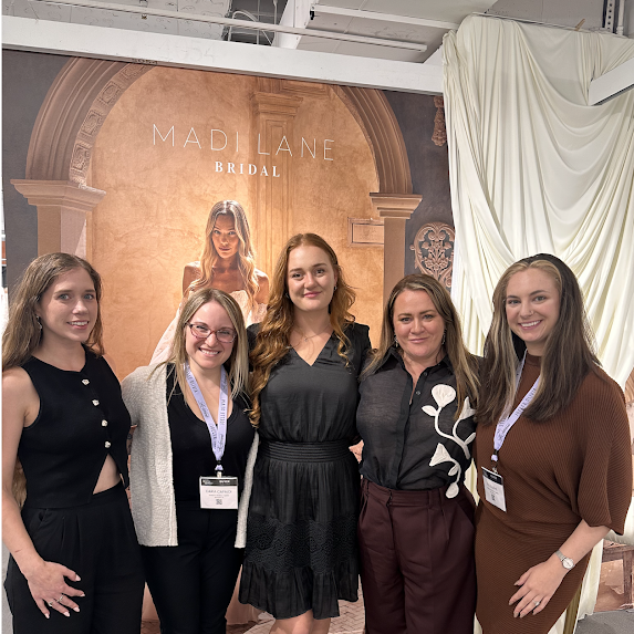 At national bridal market in chicago with madi lane head designer Liz Young