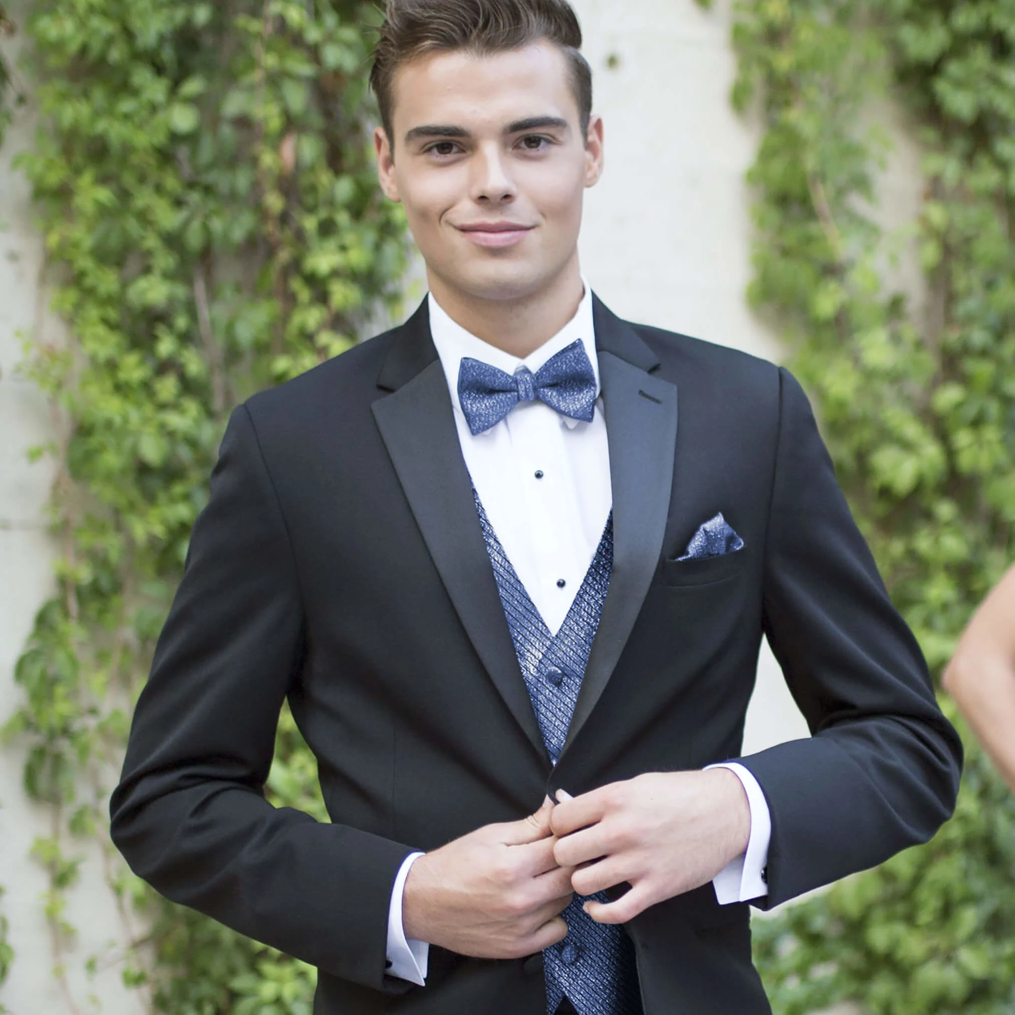 Young man in rented tuxedo for prom