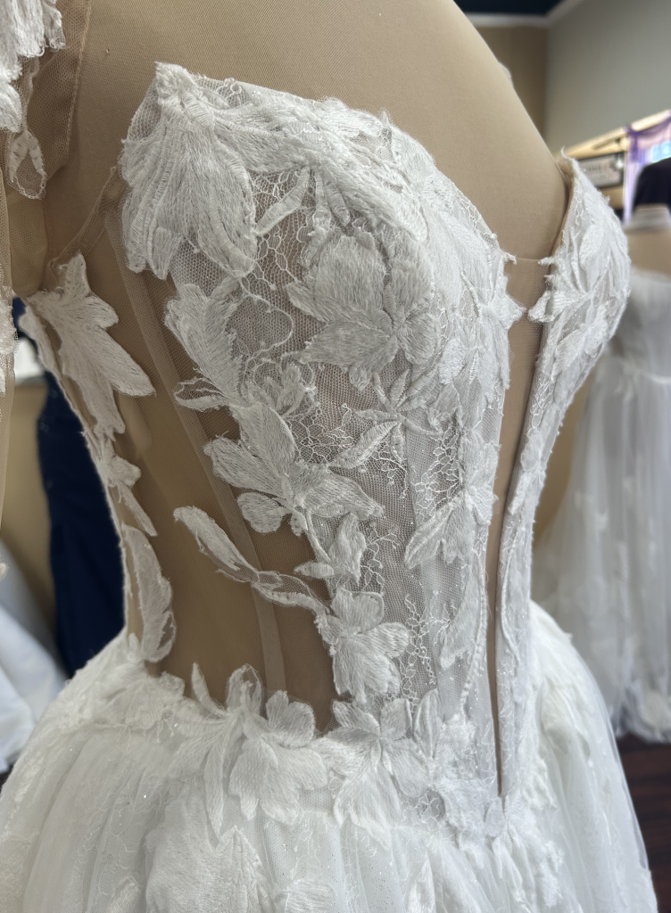 Ovani wedding dress illusion side cutouts and boning